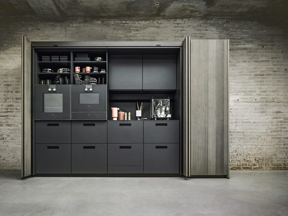 bi_fold_retractable_tall_unit_open_by_next125_luxury_german_kitchens